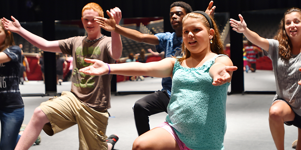 Students rehearse in this 2015 Theatre, Music, and Dance Camp photo. This year’s camp runs June 20-24 and includes a public performance at the end of the week.