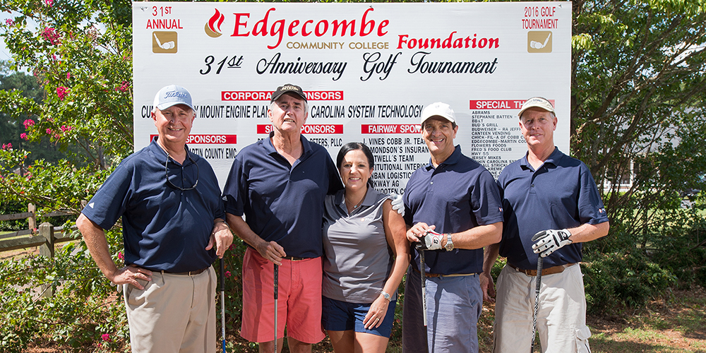 First-place winner of the ECC Foundation Golf Tournament was PNC Bank #2, with team members (from left) Monty Pollard, Ben Anderson, Jerome Creech, and Tee Boyd. Shown center is Angela Hicks, Tarboro branch manager of PNC Bank.