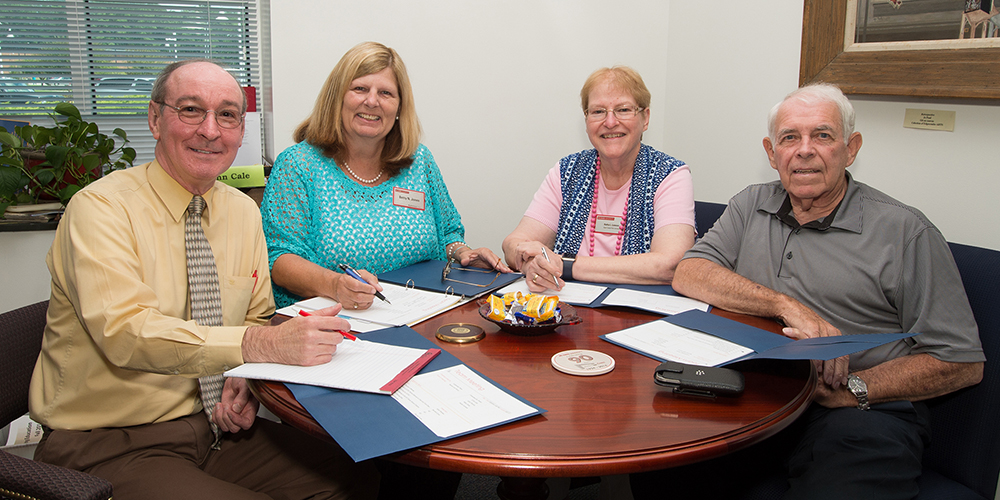 A recent planning meeting of the Upper Coastal Plain Learning Council leadership at Edgecombe Community College included (from left) J. Lynn Cale, Betty Jones, Kathy Lawson, and Joe Tolson.