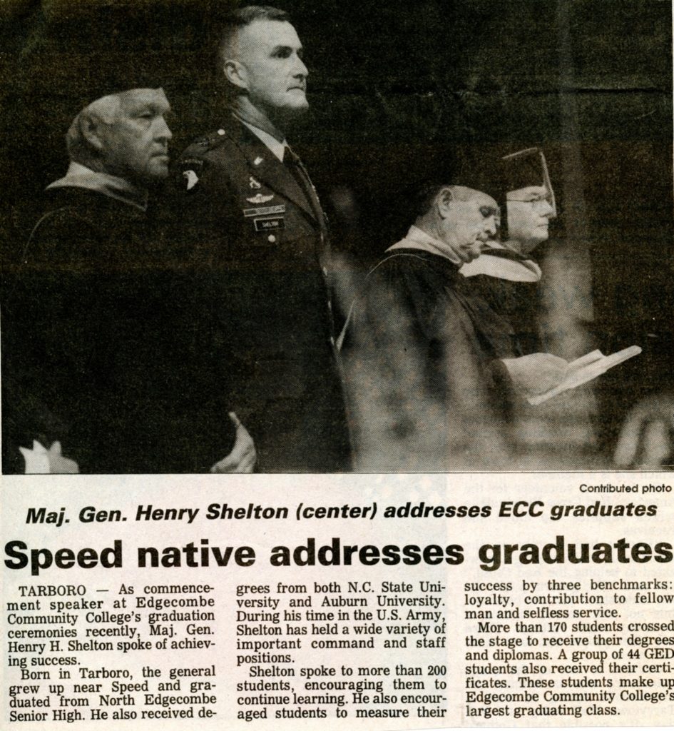 Photo: Arguably Edgecombe County’s most famous native son, Major General Hugh Shelton returned home to deliver the commencement address to ECC graduates in September 1991. General Shelton urged the graduates to continue their education and to measure their success by three benchmarks: loyalty, contribution to humankind, and selfless service. Shown at left is James Long, a college trustee from 1979 to 2016.