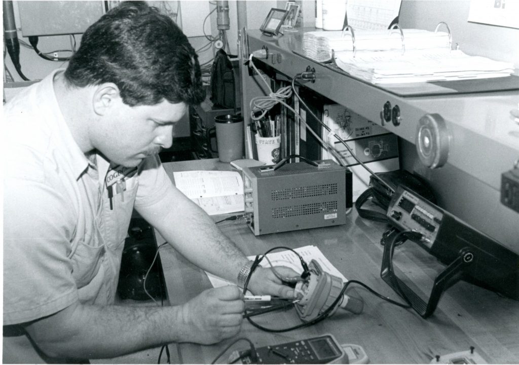 Photo: Edgecombe’s most important mission is to provide practical, up-to-date job training in employable fields. In this 1994 photo, student Ceaso Lewis gets hands-on training in Industrial Electronics Cogentrix.