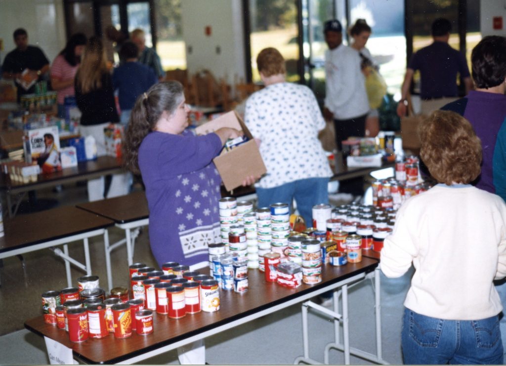 Photo: In the aftermath of Hurricane Floyd in 1999, the student lounge on the Tarboro campus became a distribution center for canned goods and other nonperishable items. From across the country, truck after truck, loaded with donations, made its way through flooded and debris-choked roads.