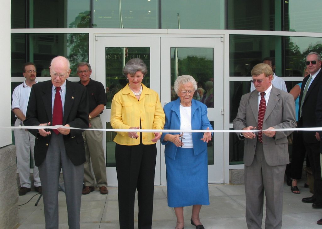 Photo: The dedication of the new Arts, Civic, and Technology Center (now the Fleming Building) on the Tarboro campus was held in June 2004. From left, cutting the ribbon are Dr. Thomas Fleming, trustee chair; Jean Bailey, ECC Foundation president; Nina Fountain, former ECC Foundation president, and Dr. Hartwell Fuller, ECC president. Major support for the project came from the ECC Foundation, Consolidated Diesel Company, KCST, the Jack D. Mobley Estate, and the Town of Tarboro.